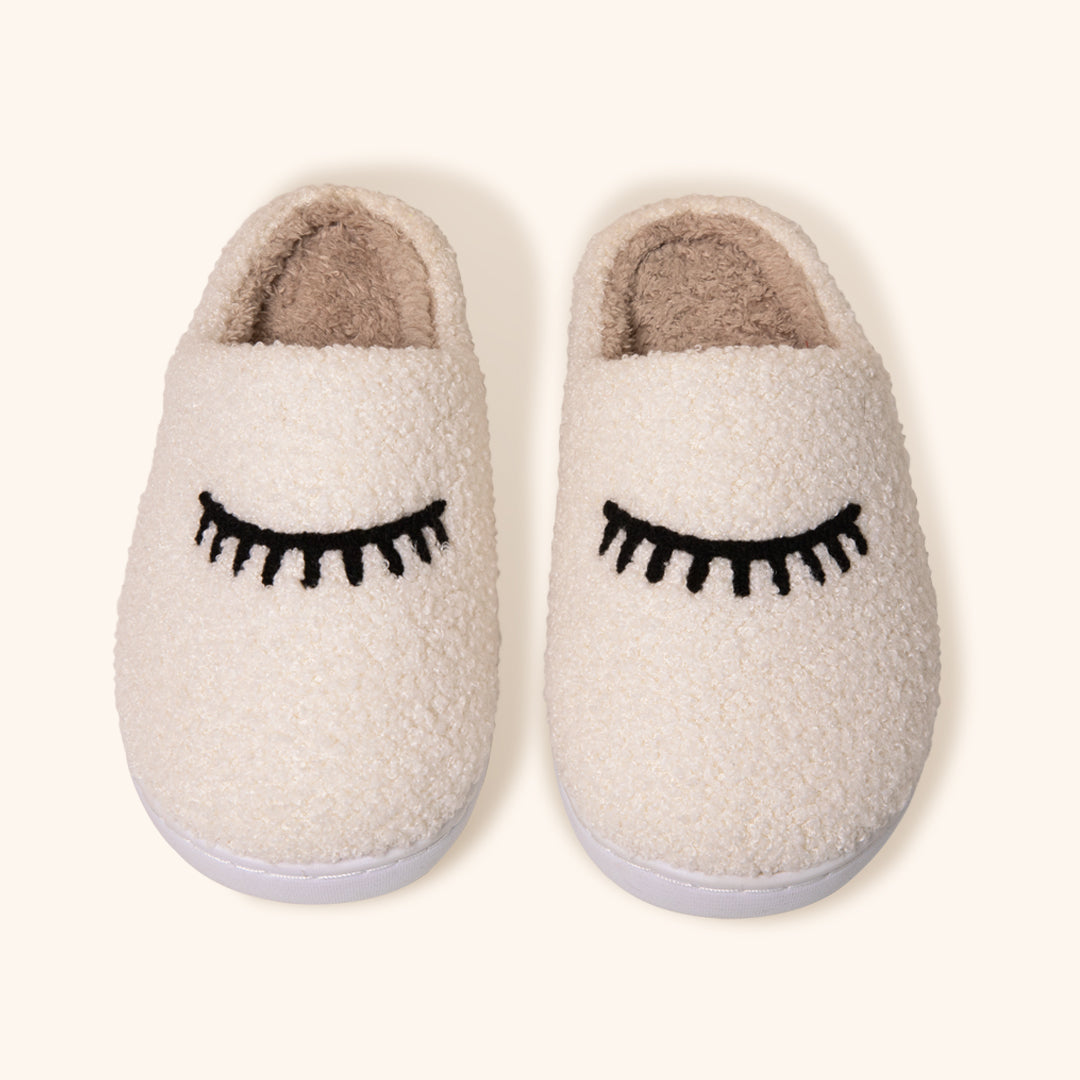 Comode pantofole Teddy con design a ciglia