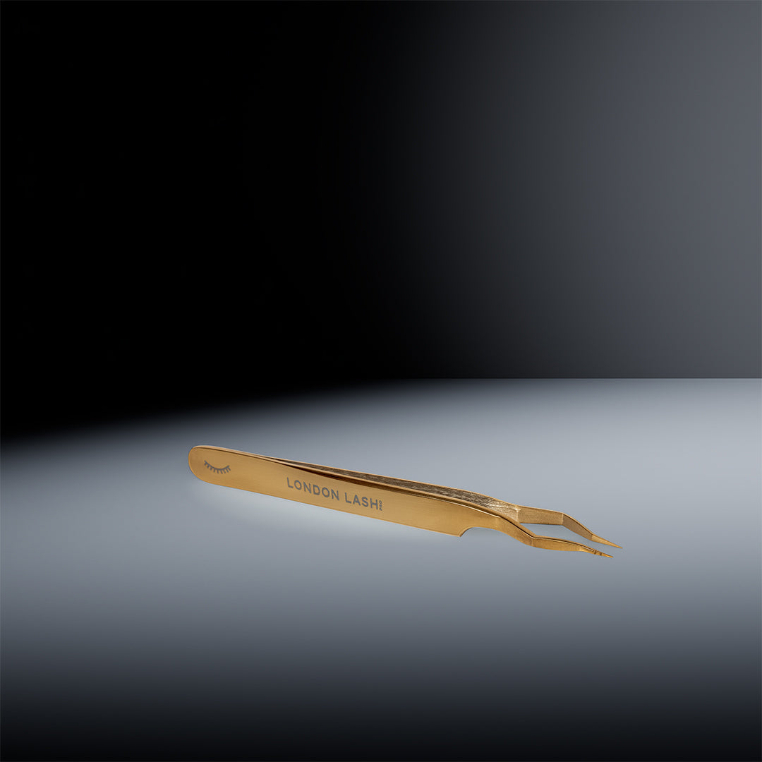 Pinzetta multifunzionale