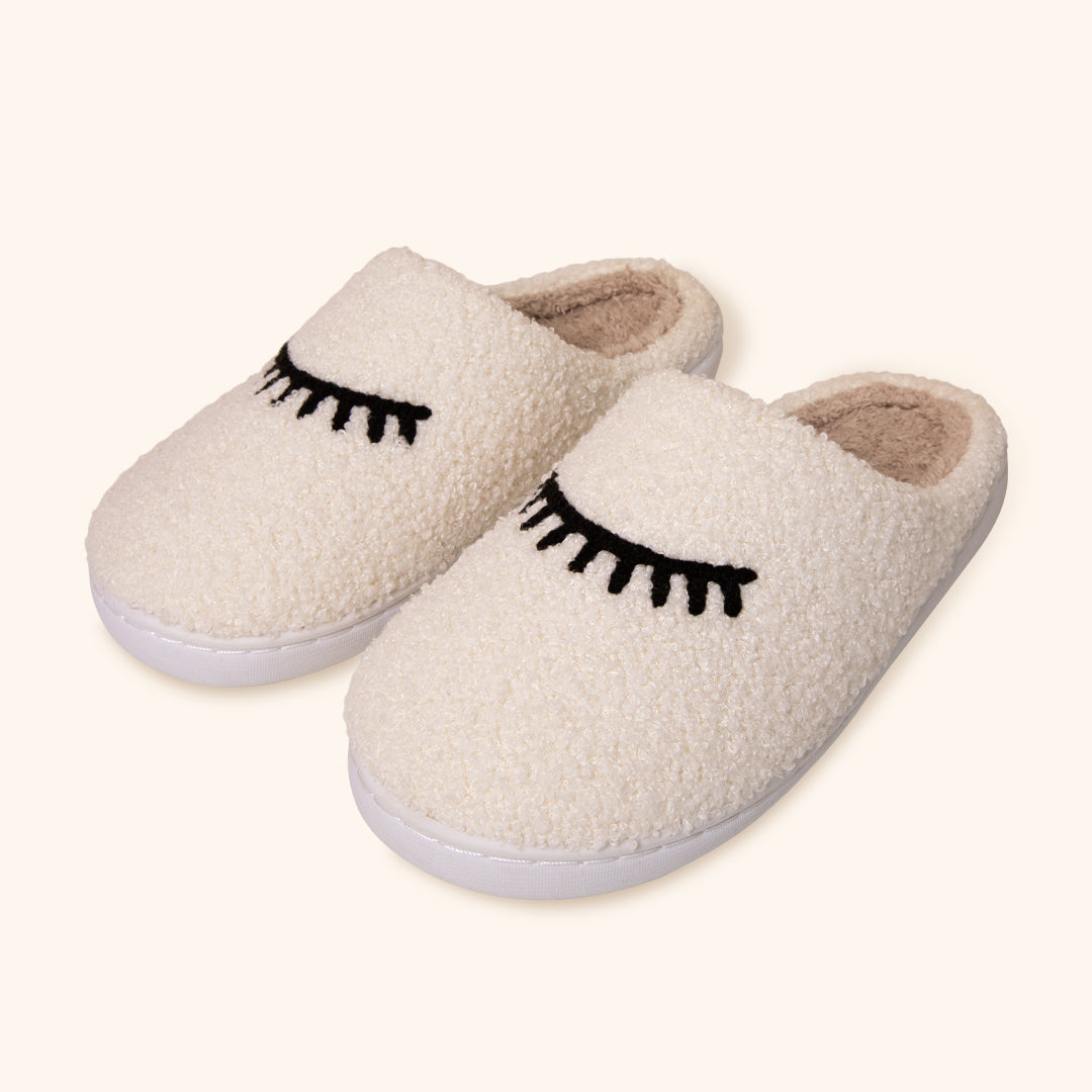 Comode pantofole Teddy con design a ciglia